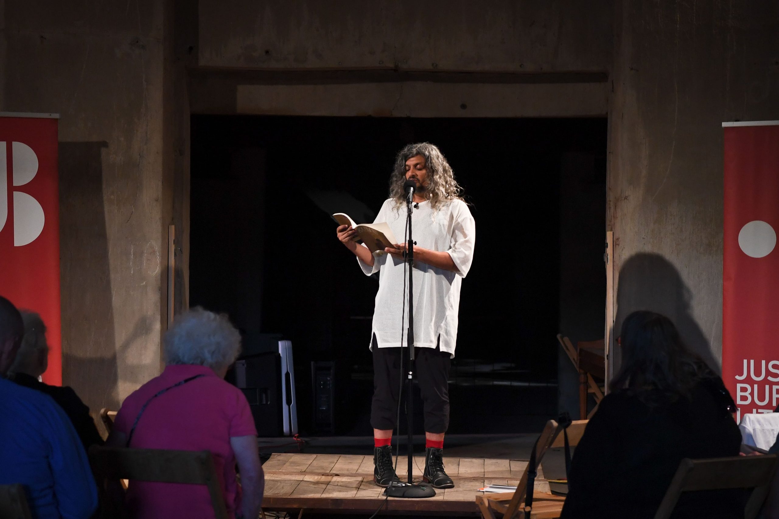 Kazim Ali reads at the Silo City Reading Series on August 18, 2018