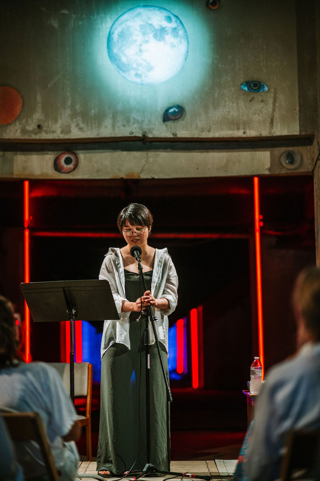 JBLC 2023 Poetry Fellow Ae Hee Lee reading at the Silo City Reading Series August 26, 2023 photo credit Pat Cray
