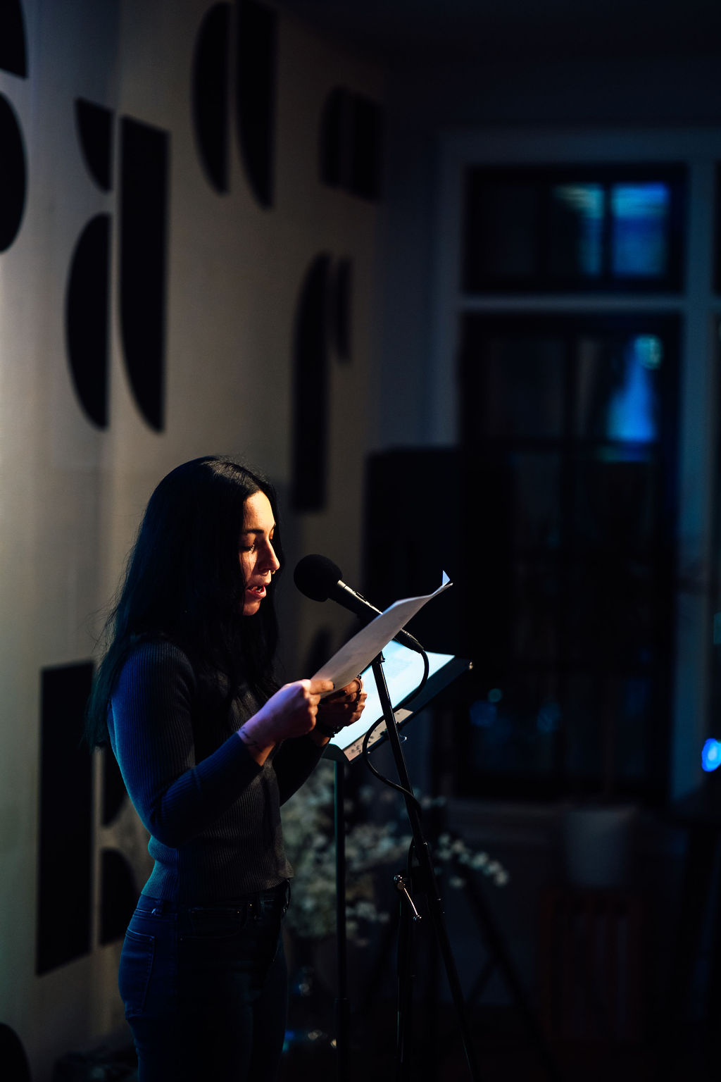 Julieanne Neely reading from side photo by Pat Cray