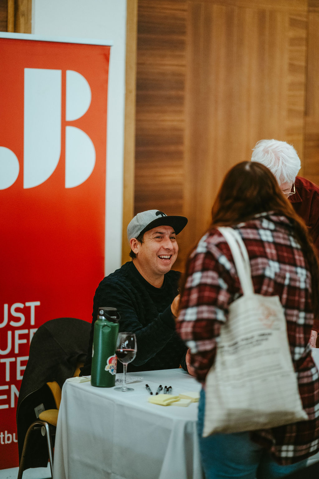 Tommy Orange signing books at BABEL photo credit Pat Cray