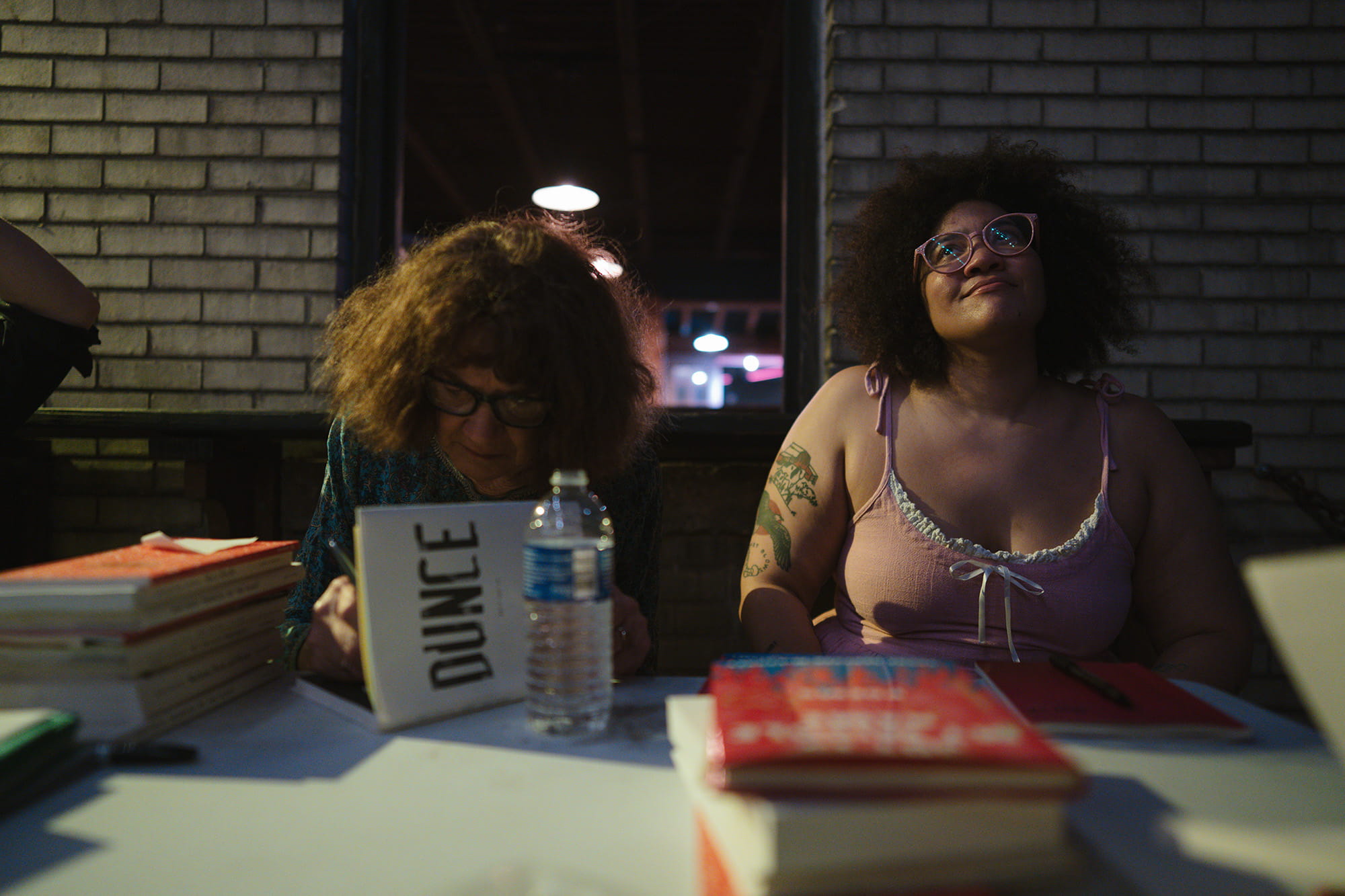 Mary Ruefle and Sasha Debevec-McKenney signing books at Duende // July 18,2026 // photo credit Pat Cray