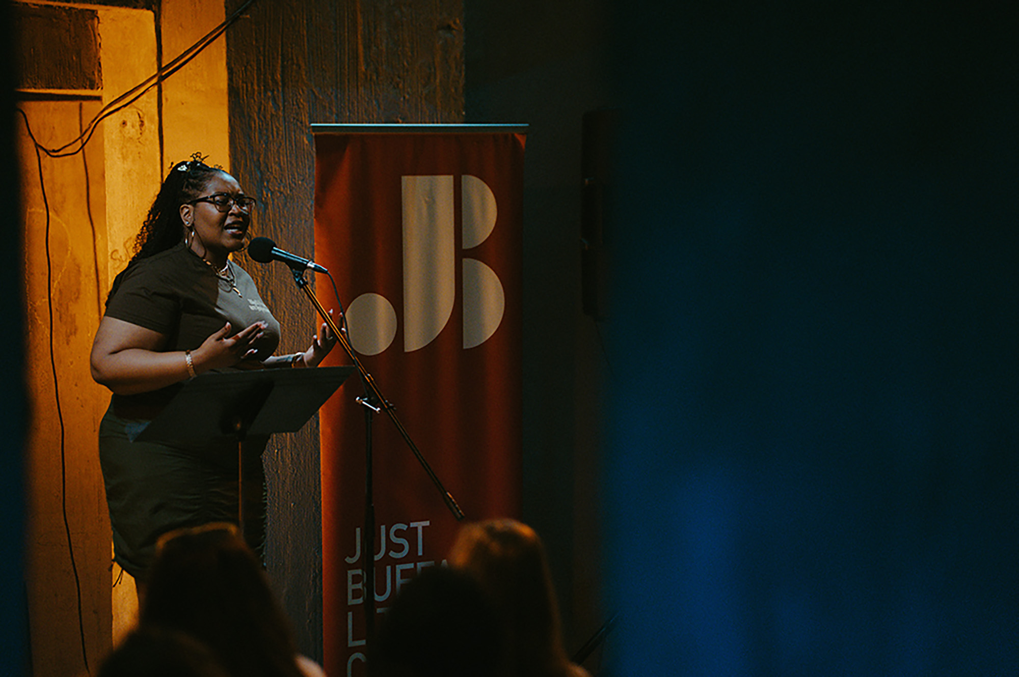 Jillian Hanesworth performing at the Silo City Reading Series in gratitude photograph by Pat Cray 6.27.2026
